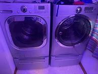 Image result for Red Top Load Whirlpool Cabrio Washer and Dryer Set