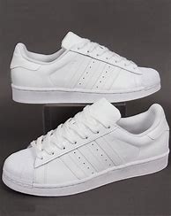 Image result for White Adidas Trainers