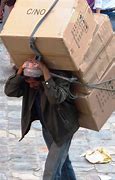 Image result for free pics of people carrying many suitcases on their backs