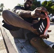Image result for Cloth Adidas Running Shoes