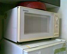 Image result for Microwave Mounted above Stove