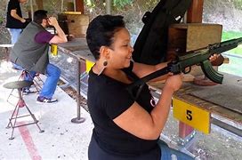 Image result for Women with SKS Rifle