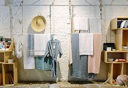 Image result for Wall Mounted Clothes Hanger Storage Ideas