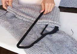 Image result for How to Hang Sweaters On Hangers