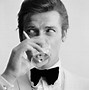 Image result for Roger Moore Drinking
