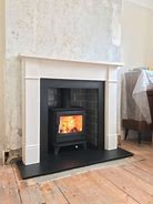 Image result for Wood Stove Fireplace Surrounds
