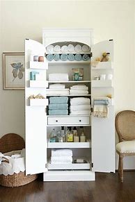 Image result for Armoire Linen Cabinet