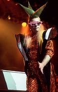 Image result for Elton John Concert Outfits