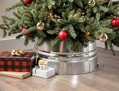 Image result for Bash Silver Christmas Tree Collar 27" | Crate & Barrel