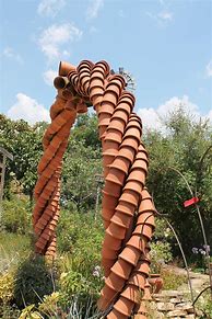 Image result for Unique Garden Art From Junk