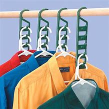 Image result for Space-Saving Hangers for Shirts