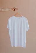 Image result for White Shirt On a Hanger in a Dark Room