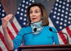 Image result for Nancy Pelosi in Kente Cloth Getting Help Up