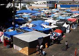 Image result for Spain migrant camp fire