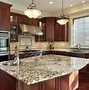 Image result for What Granite Countertop Goes with Bronze Sunset Appliance