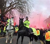 Image result for Liverpool's team bus attacked with brick