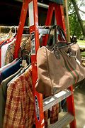 Image result for How to Store Hangers for Clothing Store
