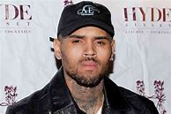 Image result for Chris Brown Piercings