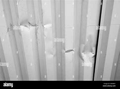 Image result for Dented Metal Wall