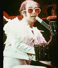 Image result for Elton John White Feather Costume