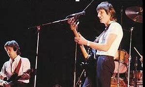 Image result for Eric Clapton and Roger Waters Hunting