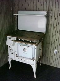 Image result for Vintage Cast Iron Tile Cook Stove