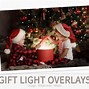 Image result for 29-In. Green Tree With Star Topper And Red Umbrella Base With Animated Musical Snow By Ashley Homestore, Home Decor > Home Accents. On Sale - 64% Off