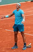 Image result for Rafael Nadal Nike Yellow