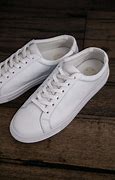 Image result for Women's White Leather High Top Sneakers