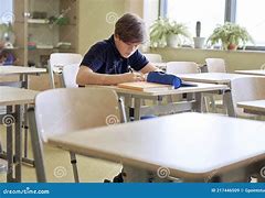 Image result for Student Sitting at Desk Alone