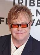Image result for Elton John Long Feathered Hair