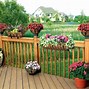 Image result for Hanging Baskets On Privacy Fence