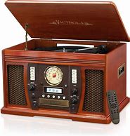 Image result for Victrola Navigator 8-In-1 Classic Bluetooth Record Player With USB Encoding & 3-Speed Turntable, Brown
