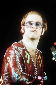 Image result for Elton John On Stage 70s