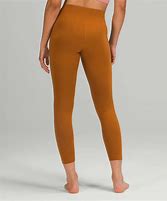 Image result for Lululemon Women's Yoga High Rise Instill High-Rise Tights 25" - Gold/Yellow/Auric Gold - Size 14 - Smoothly Supportive/Smoothcovertm Fabric