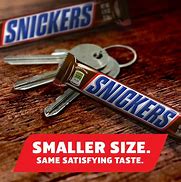 Image result for Snickers 100 Calories Chocolate Candy Bars, 0.76 Oz Bar, 24-Count Box