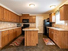 Image result for Cherry Wood Kitchen Cabinets