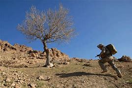 Image result for Soldier Climbing a Mountain