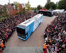 Image result for Liverpool's team bus attacked with brick
