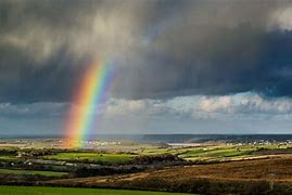 Image result for Beautiful Storm Clouds and Rainbow