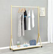 Image result for fold clothing hangers racks