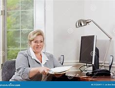 Image result for Lady with a Desk of Paperwork