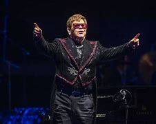 Image result for Elton John Singing with a Band