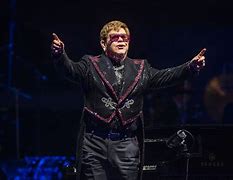 Image result for Elton John Singing Hauliula