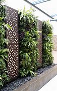 Image result for 72 Pockets Vertical Wall Garden Planter Hanging Gardening Bags Outdoor Indoor Greening Planter Bags Pouch Flower Herbs Growing Container For Garden