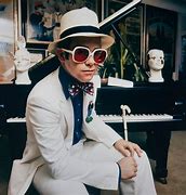 Image result for Elton John with White Feathers