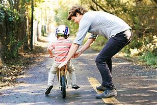 Image result for free picture of parent and child and training wheels