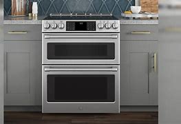 Image result for UPDW90FDMPB 36" Professional Plus Dual Fuel Range With 5 Sealed Burners Double Oven Griddle Rotisserie And Warming Drawer In