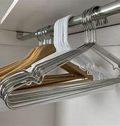Image result for One Side Hinged Rolling Closet Clothes Hanger