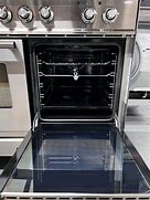 Image result for UPDW100FDMPI 40" Professional Plus Series Freestanding Dual Fuel Range With Griddle 2 Ovens 4 Sealed Burners Warming Drawer And 4 Cu. Ft. Total Oven Capacity In Stainless